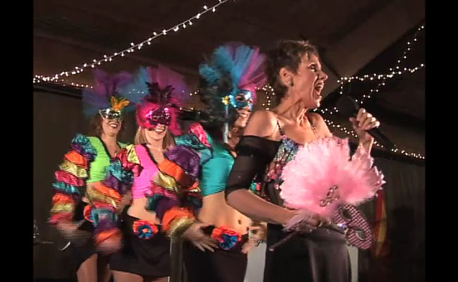 photo of mardi gras singers and dancers